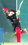 Canada's John Davison bats during a practice session in Hambantota 