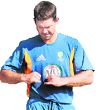 Ricky Ponting compares his injured finger on his left hand with one on his right hand.