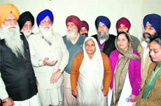 Families of victims of the 1984 riots from Haryana with SGPC President Avtar Singh Makkar, in Bathinda on Monday.