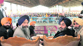 Deputy CM Sukhbir Singh Badal (right) and SAD general secretary Prof Prem Singh Chandumajra at a protest rally at Moonak, Sangrur, on Monday.
