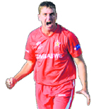 Ray Price celebrates bowling out Australia�s David Hussey.