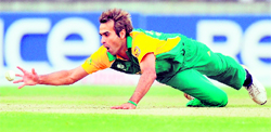 Imran Tahir dives to take a catch in the match against West Indies at the Feroz Shah Kotla Stadium in New Delhi on Thursday. Tahir claimed 4 for 41