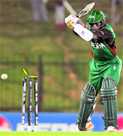 Kenya's Shem Ngoche is bowled by Pakistan's Umar Gul. The associate teams have struggled at the World Cup.