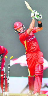 Canada�s John Davison is bowled by Ray Price in Nagpur on Monday. � AFP