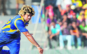 Sri Lanka�s Lasith Malinga in action against Kenya at the R. Premadasa Stadium in Colombo on Tuesday. Malinga picked up a hat-trick to set up a huge 9-wicket victory for Sri Lanka.