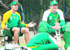 South Africa�s Dale Steyn (L) and captain Graeme Smith at a training session in Mohali on Tuesday.