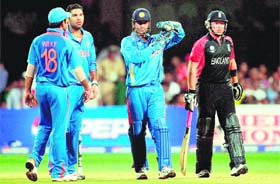 MS Dhoni (2-R) gestures for a review of a not-out decision by the umpire in favour of England�s Ian Bell (R) during their match at The M. Chinnaswamy Stadium in Bangalore on February 27