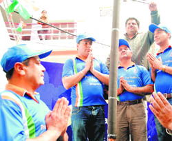 Fans pray for the victory of the Indian team in the World Cup after lighting a six-foot-long incense stick in Patiala on Friday.