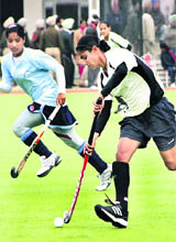 A match in progress between Tarn Taran and Patiala at the Olympian Surjit Singh Hockey Stadium in Jalandhar on Friday.