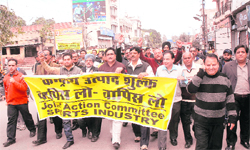 Members of the Joint Action Committee of the sports industry hold a protest in Jalandhar