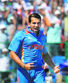 Zaheer Khan celebrates the wicket of Ireland's Edmund Joyce at the M. Chinnaswamy Stadium in Bangalore on Sunday. Zaheer picked up three wickets for 30 runs.