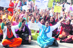 Members of the Punjab Nursing Association hold a protest in Patiala 