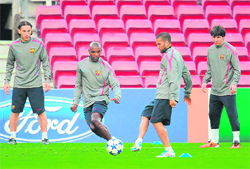 Barcelona players train at Camp Nou stadium in Barcelona on Monday, on the eve of their Champions League match against Arsenal FC. Arsenal lead 2-1 on aggregate