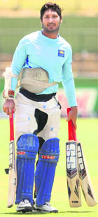 Sri Lankan captain Kumar Sangakkara walks towards the nets during a training session at the Pallekele International Cricket Stadium on Wednesday.