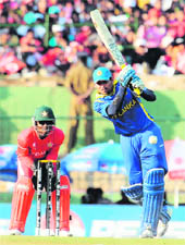 Tillakaratne Dilshan plays a shot against Zimbabwe on Thursday. Dilshan scored 144. � AFP