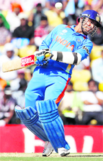 Virender Sehwag evades a rising delivery during the Group B match against South Africa in Nagpur on Saturday.