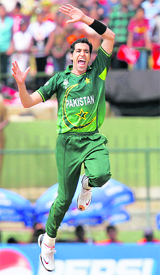Umar Gul celebrates dismissing Zimbabwe�s Regis Chakabva in Pallekele on Monday.
