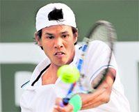Somdev Devvarman hits a backhand against Xavier Malisse during the BNP Paribas Open at the Indian Wells Tennis Garden on Monday in Indian Wells, California. 