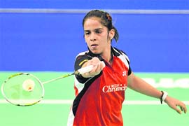Saina Nehwal plays a shot during the women's singles semifinal match at the Swiss Open tournament in Switzerland on Saturday