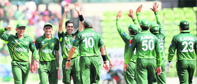 Pakistan players celebrate the dismissal of West Indies batsman Chris Gayle during their quarterfinal at the Sher-e Bangla National Stadium in Dhaka on Wednesday. Pakistan won by 10 wickets.