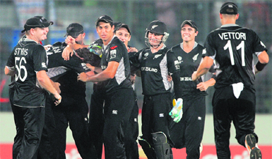 New Zealand players celebrate the dismissal of South Africa�s Johan Botha in Dhaka on Friday. New Zealand won by 49 runs