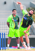 Pakistan captain Shahid Afridi (R) and coach Waqar Younis will do well to remember that their bowlers have not been tested so far in this tournament.