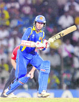 Upul Tharanga plays a shot against England in Colombo on Saturday. 