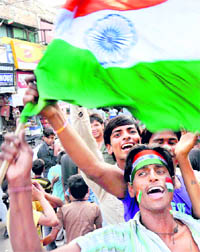 Fans celebrate Indian team�s victory over Sri Lanka in the World Cup final