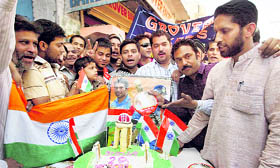 Cricket fans celebrate India�s victory a day after the Men in Blue defeated Sri Lanka in the World Cup final, in Amritsar on Sunday.