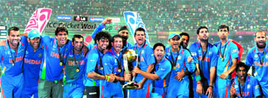 cup of joy: Team India celebrate after winning the Cricket World Cup at the Wankhede Stadium in Mumbai on Saturday. India beat Lanka by 6 wickets.