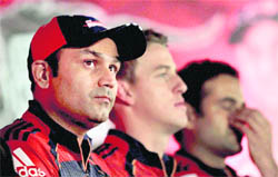 Virender Sehwag (L), Morne Morkel (C) and Irfan Pathan during a media interaction in New Delhi. 