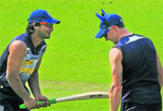 Deccan Chargers' Kumar Sangakkara (L) and Dale Steyn during training in Kolkata on Sunday. 