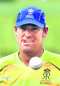 Rajasthan Royals skipper Shane Warne tosses the ball during practice in Jaipur on Monday.
