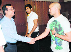 Sports Minister Ajay Maken meets boxers at the NIS in Patiala on Monday. 