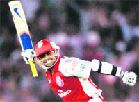 King�s batsman Paul Valthaty celebrates his hundred in Mohali