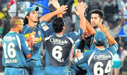 Deccan Chargers� players celebrate the fall of a wicket in Hyderabad