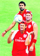 Kings XI Punjab�s Adam Gilchrist heads a football during a training session in Hyderabad on Friday. �