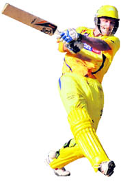 Mike Hussey hits a boundary on Saturday.