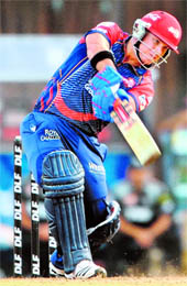 Delhi Daredevils� David Warner plays a shot during their match against Pune Warriors India at the D.Y. Patil stadium in the outskirts of Mumbai on Sunday. Dardevils won by three wickets