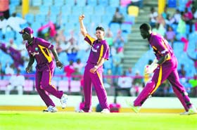 West Indies bowler Ravi Rampaul (C) celebrates after taking the wicket of Pakistan�s Umar Akmal during the Twenty20 international in St Lucia on Thursday