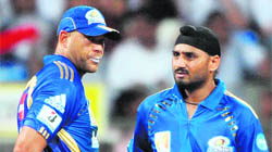 Andrew Symonds (L) and Harbhajan Singh are now teammates in Mumbai Indians.