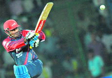 Virender Sehwag plays a shot in Delhi on Saturday.