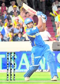 Mumbai Indians� Rohit Sharma hits a six during his innings of 56 runs against Deccan Chargers in Hyderabad on Sunday. Mumbai Indians won by 37 runs