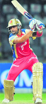 Virat Kohli hits a boundary in Delhi on Tuesday.