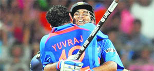 Yuvraj Singh celebrates with MS Dhoni after India won the World Cup final in Mumbai on April 2. 