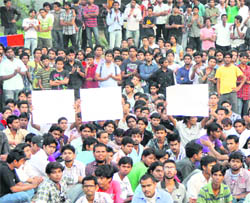 Students of Lovely Professional University in Phagwara hold a protest on Wednesday following the death of a student on Tuesday night. The classes have been suspended till Saturday