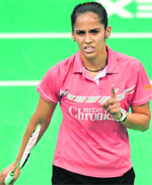 Saina Nehwal reacts after losing a point against Japan's Ai Goto during the Yonex-Sunrise India Open Superseries 2011 at the Siri Fort Sports Complex in New Delhi on Wednesday. Saina lost to Goto 17-21, 19-21