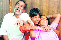 Grieving parents of security man Ghanshayam in Amritsar on Thursday.