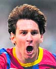 Barcelona's forward Lionel Messi celebrates after scoring at the Santiago Bernabeu stadium in Madrid