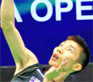 Top seed Lee Chong Wei of Malaysia in action against Hu Yun of Hong Kong in the men's singles semifinal during the India Open in New Delhi on Saturday